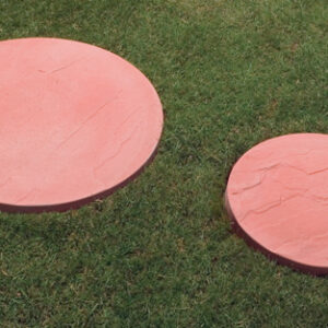 Red paving stepping stones on grass