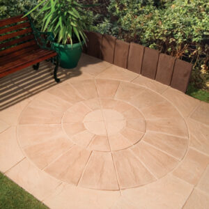 Stone coloured paving circle with bench