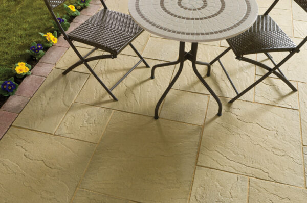 York coloured patio paving with tables and chairs