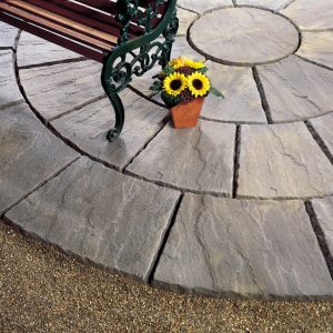 Thakeham flag stone paving circle with bench